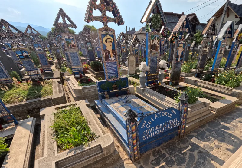 Painted wooden grave markers in the Merry Cemetery of Săpânța