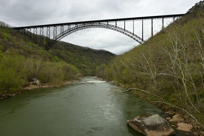 The New River Gorge Bridge arching over the river
