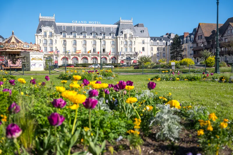 The Grand Hôtel in Cabourg behind a bed of tulips