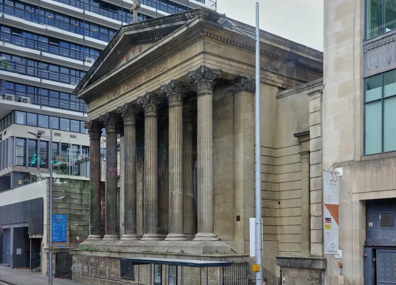 The columned front of St Mary on the Quay church