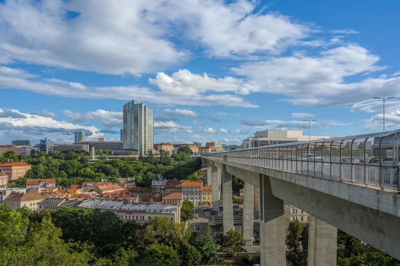 Prague's Nusle Valley with the Nusle Bridge and the city skyline under clouds