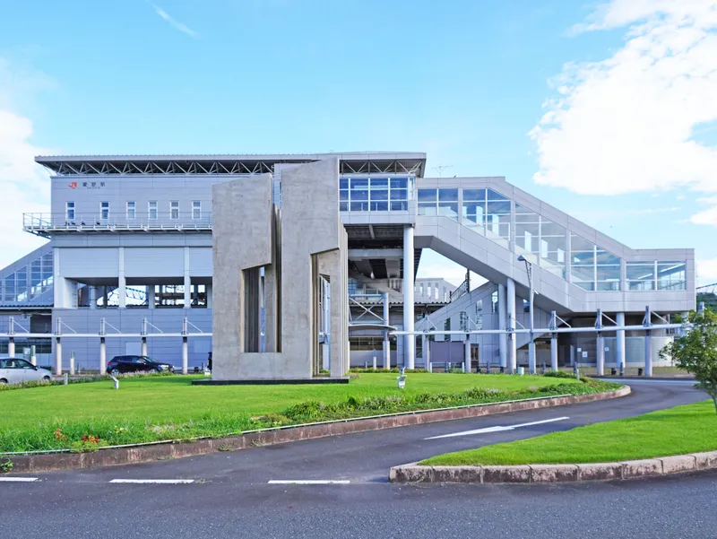 The north exit building of Aino Station with a lawn in front